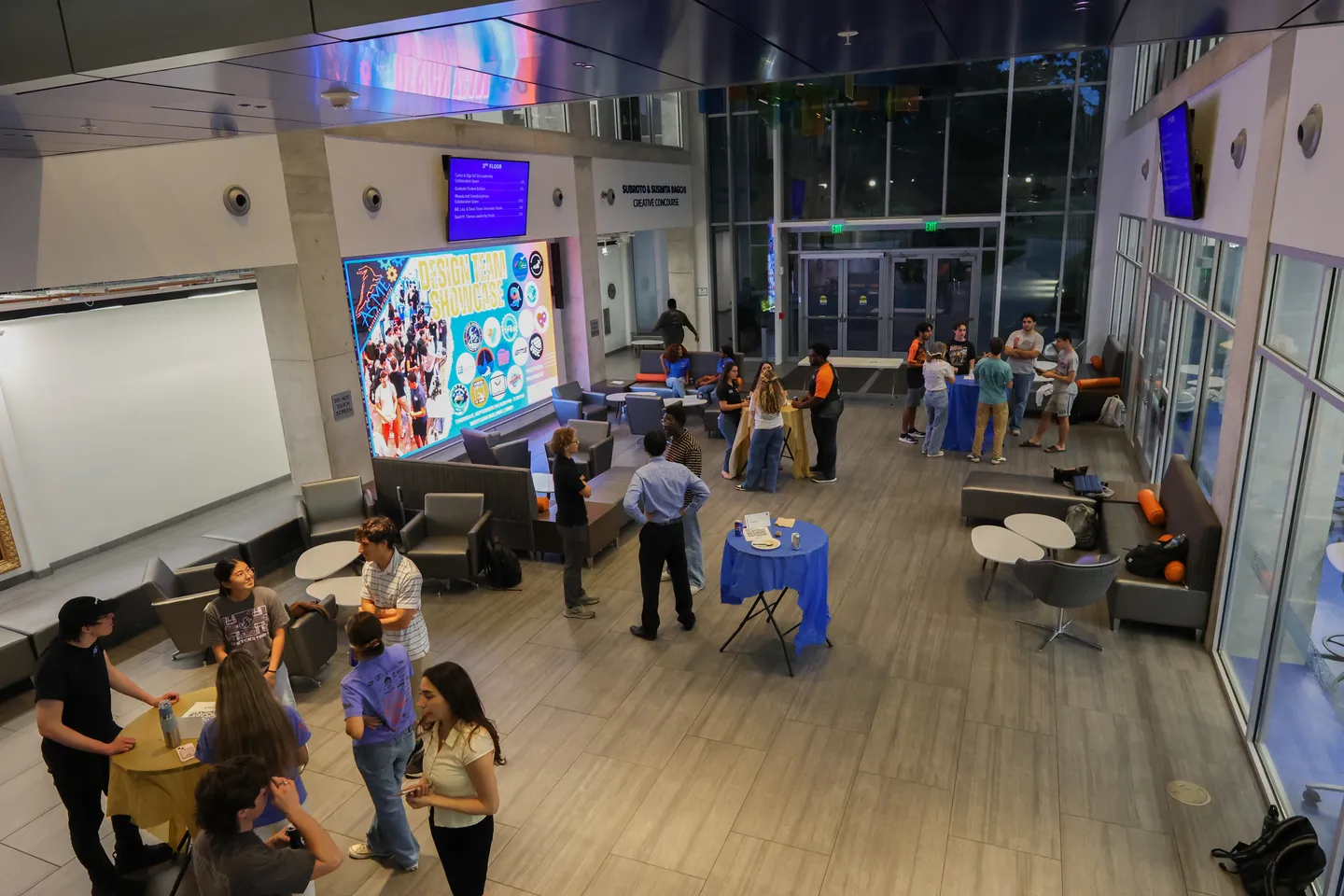 An overhead view of attendees talking in small groups at the Fall 2026 Leadership Summit.