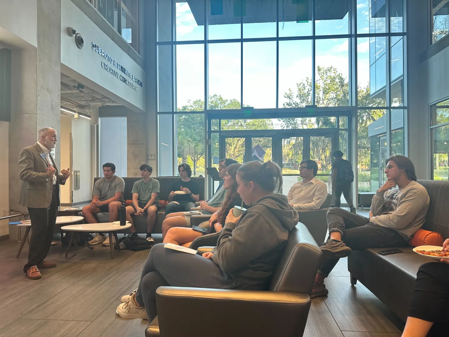 ELC attendees listening to a speaker during a general body meeting.